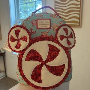 Loungefly Disney Parks Red and Cream Peppermint Backpack